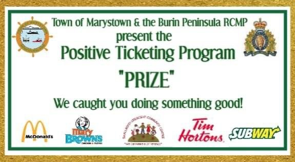 A rectangular ticket with the wording: Town of Marystown & Burin Peninsula RCMP present the Positive Ticketing Program, PRIZE, We caught you doing something good! Logos for the town and RCMP, as well as supporting partners, are also on the ticket.