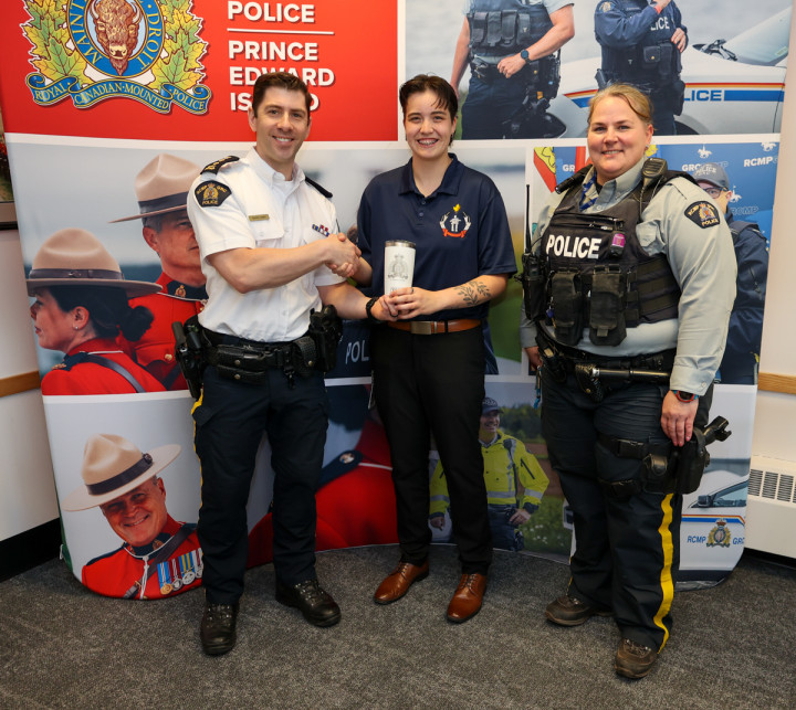 Left to Right - PIE RCMP Commanding Officer Chief Superintendent Kevin Lewis, Darcie Augustine, and Constable Amy Handrahan 