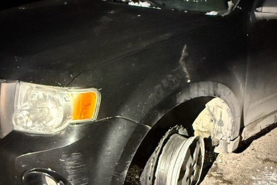 A vehicle with a damaged front end.